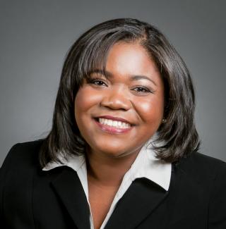 A headshot photo of Corey Toler-Franklin